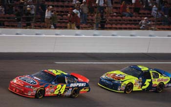 Jeff Gordon and Kyle Busch in race cars
