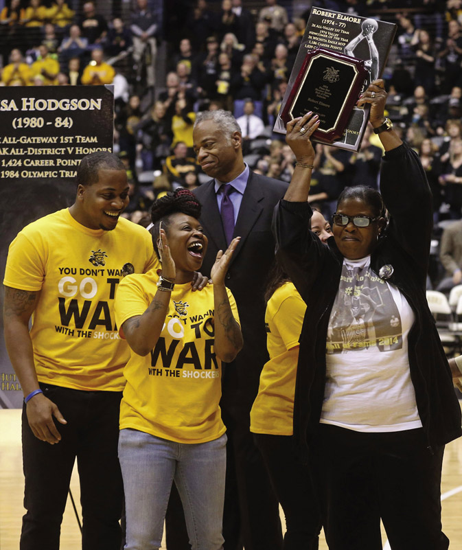 family members celebrate the induction of the late Robert Elmore into WSU's Shocker Sports Hall of Fame