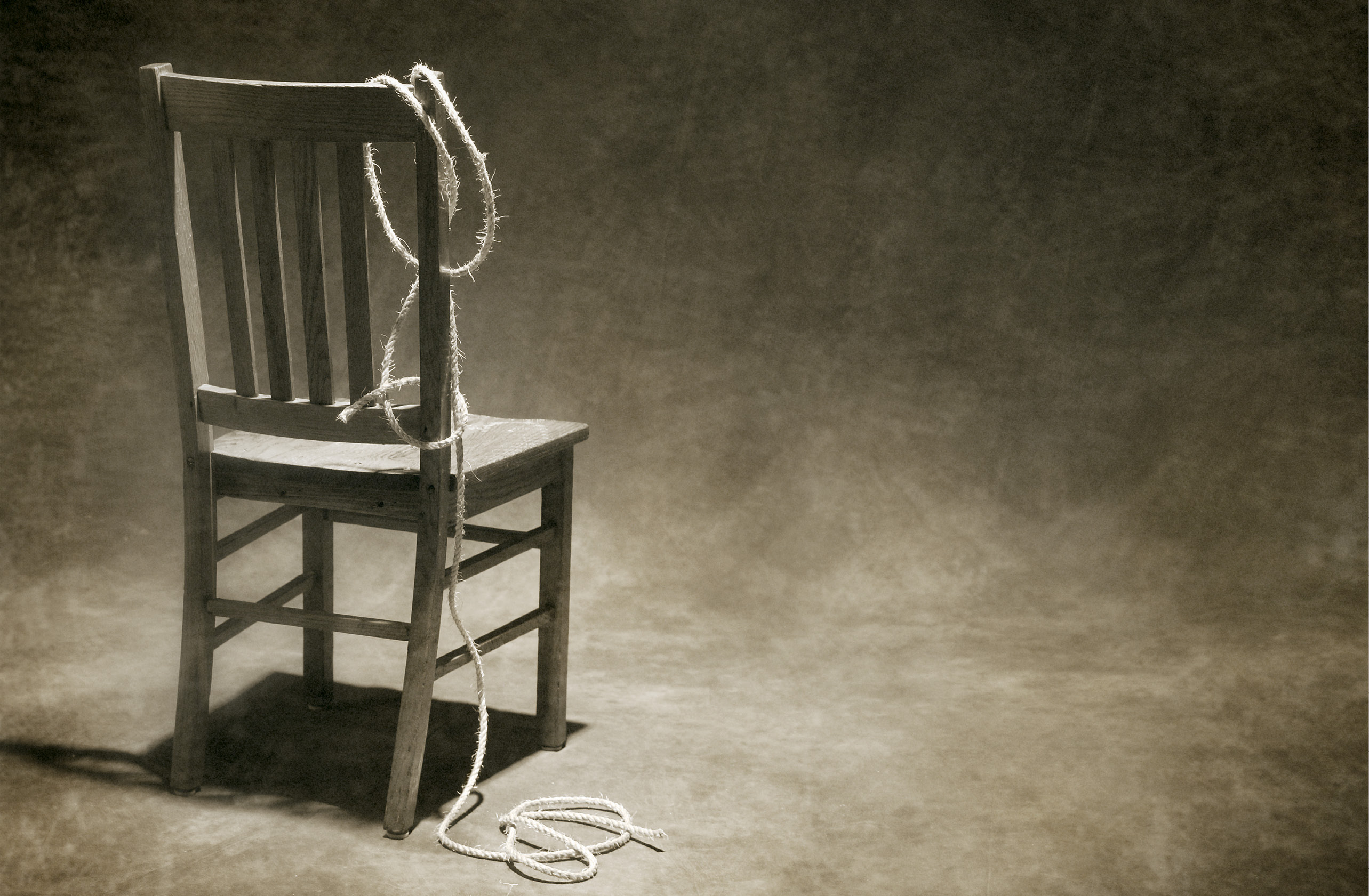 photo of a chair and rope
